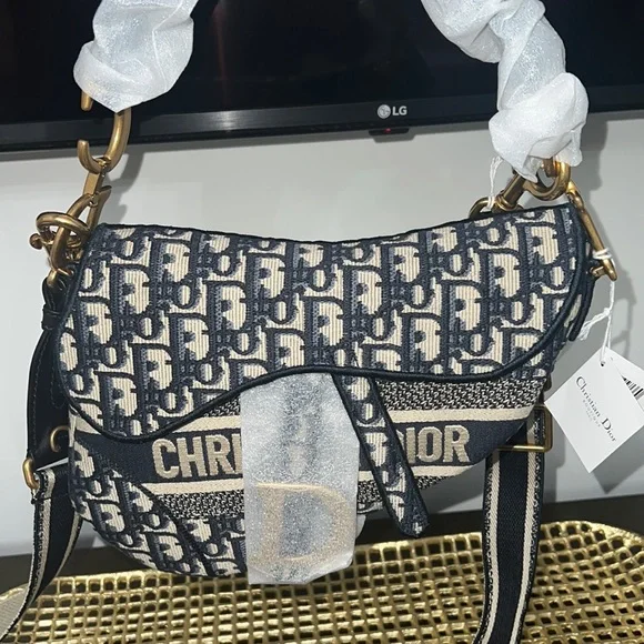 Poshmark dior saddle hot sale bag